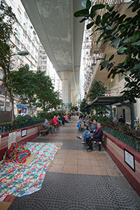 Sitting out on benches underneath the flyover, Hill Road, Shek Tong Tsui, 22 December 2019