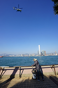 Fishing on the waterfront at Sheung Wan, 7 December 2019