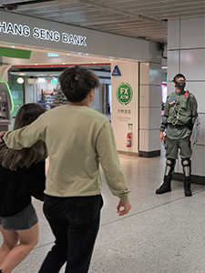 Policeman in riot gear inside the Central MTR station, Christmas Eve, 24 December 2019