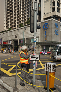 Mending vandalized traffic lights on Salisbury Road, Tsim Sha Tsui, 26 December 2019