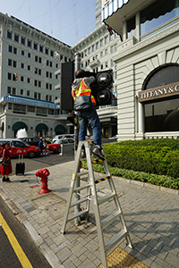 Mending vandalized traffic lights on Salisbury Road, Tsim Sha Tsui, 26 December 2019