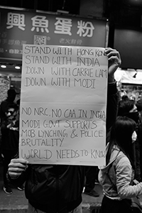 Protester with a sign, Wanchai, 1 January 2020