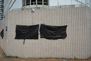 Black plastic bags covering graffiti on the Central Police Station, Sheung Wan, 22 July 2019