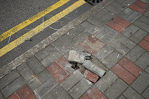 Pried up paving bricks, Sheung Wan, 22 July 2019