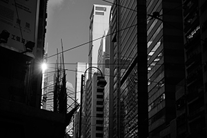 Buildings in shadow, Des Voeux Road Central, Sheung Wan, 25 July 2019