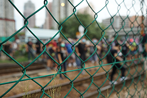 Protesters occupying the Light Rail tracks, 'Reclaim Yuen Long' protest against the mob attack on 7.21, 27 July 2019
