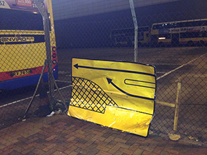 A damaged road direction sign on the ground, Western Fire Services Street, Sheung Wan, 29 July 2019
