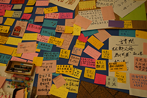 Comments on stickers, Admiralty Centre, Harcourt Road, 6 July 2019