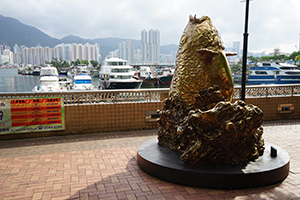 Sculpture of a fish jumping out of water, Lei Yue Mun, 12 July 2019