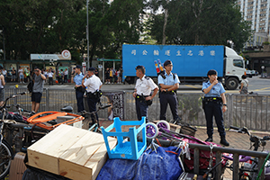 Police on the street near the MTR station, Sheung Shui, 13 July 2019