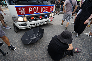 Protesters trapping a police vehicle, 'Reclaim Sheung Shui' protest against parallel traders from China, 13 July 2019