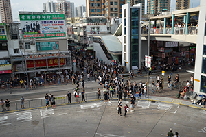 Protesters transferring materials in a line, 'Reclaim Sheung Shui' protest against parallel traders from China, Lung Sum Avenue, Sheung Shui,  13 July 2019