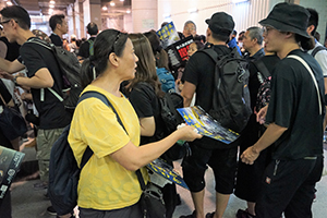 Protesters handing out posters, Tai Wai Station Public Transport Interchange, 14 July 2019