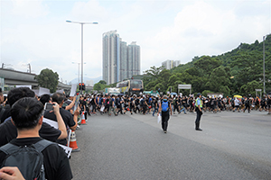 Crowds marching from Tai Wai to Che Kung temple, the start point of an anti-extradition bill march to Sha Tin,  14 July 2019