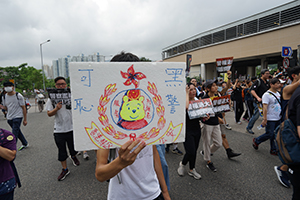 Protester with a sign, anti-extradition bill march in Sha Tin, 14 July 2019