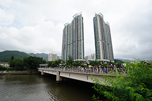 Crowds crossing the Shing Mun River on Lion Rock Tunnel Road, anti-extradition bill march in Sha Tin, 14 July 2019