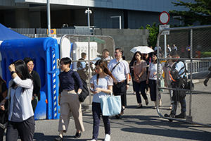 Workers leaving Central Government Offices Complex, Tim Mei Avenue, Admiralty, 5 August 2019