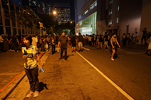 Journalist reporting outside Queen Elizabeth Stadium, Wanchai, 26 September 2019