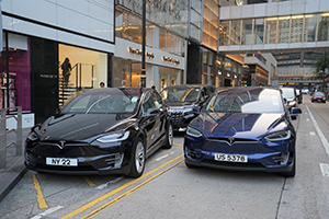 Vehicles belonging to rich people double-parked outside the Prince's Building, Chater Road, Central, 27 September 2019