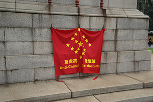 'Anti-Chinazi' banner placed on the Cenotaph by protesters, Central, 29 September 2019