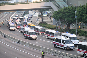 Police convoy on Harcourt Road, Admiralty, 1 October 2019