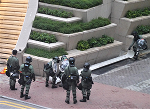 Riot police clearing a barricade, Rodney Street, Admiralty, 6 October 2019