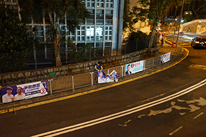 Political banners for the up-coming District Council election being placed on the street, Bonham Road, Pokfulam, 29 October 2019
