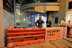 Security staff blocking steps providing an entrance to the Lan Kwai Fong nightlife area, Wyndham Street, Central, 31 October 2019