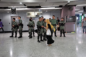 Riot police in Causeway Bay MTR station, 13 October 2019