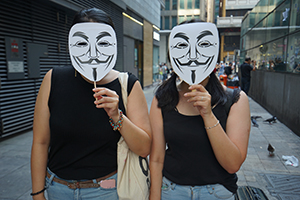 Protesters with V for Vendetta masks, Central, 1 October 2019