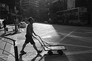 Man with a cart, Des Voeux Road West, Sheung Wan, 2 October 2019