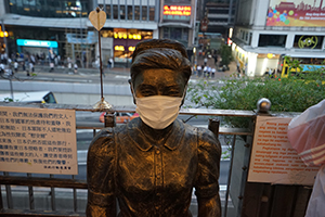Mask placed on a statue to protest against the anti-mask law due to come into force at midnight, Central, 4 October 2019