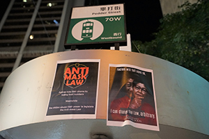 Posters on a tram stop, Des Voeux Road Central, 5 October 2019