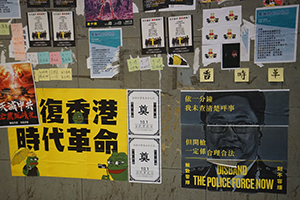 Posters on a wall, Admiralty, 6 October 2019