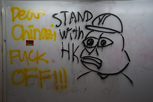 Graffiti on a tram stop, Des Voeux Road Central, 6 October 2019