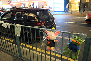 LiPig and Pepe the Frog dolls on a railing, Hoi Yuen Road, Kwun Tong, Kowloon, 12 November 2019