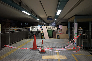 Barricade blocking a footbridge over the Cross-harbour tunnel, Hung Hom, 16 November 2019
