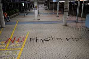 Graffiti on the ground, Cross-harbour tunnel bus stop, Hung Hom,  16 November 2019