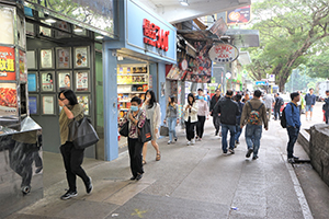 People covering their faces due to fear of tear gas residue, Nathan Road, Jordan, 19 November 2019