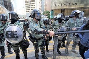 Police in anti-riot gear clearing a street occupation, Pedder Street, Central, 29 November 2019