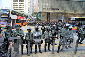 Police in anti-riot gear clearing a street occupation, Pedder Street, Central, 29 November 2019