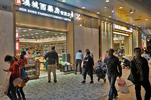 Parallel traders outside a pharmacy, Sheung Shui, 14 December 2019