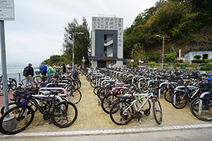 Bicycle park for commuters near to the ferry pier, Yung Shue Wan, Lamma Island, 15 December 2019