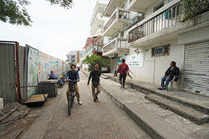 Resting outside the closed Post Office, Yung Shue Wan, Lamma Island, 15 December 2019