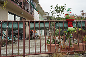 Christmas decoration on the railing of a house, Lamma Island, 15 December 2019