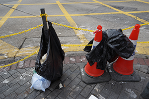 Black plastic bags used as temporary substitutes for rubbish bins, Jordan, 22 December 2019