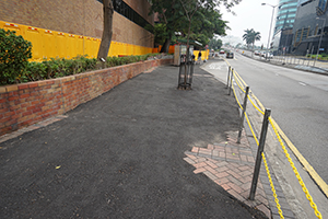 Asphalt covering areas where paving stones have been pried up, Cheong Wan Road, 22 December 2019