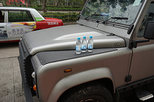 Bottles of water on a car, Chatham Road South, Tsim Sha Tsui, 22 December 2019