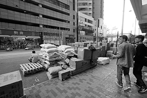 Goods that have been off-loaded onto the street, Des Voeux Road West, Sheung Wan, 25 December 2019