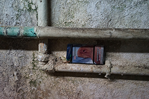 Pack of cigarettes left on pipes, basement level of Champagne Court, Carnarvon Road, Tsim Sha Tsui, 26 December 2019